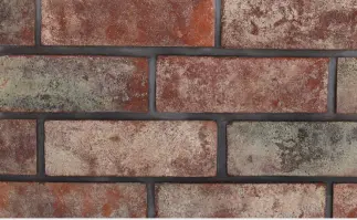 Gray wall with a small hole, up close, featuring of stone pattern.