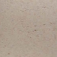 Light beige soft stone with a slightly textured surface and darker speckles.