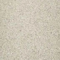 Light-colored soft stone with a fine-grained texture and specks of gray and beige.