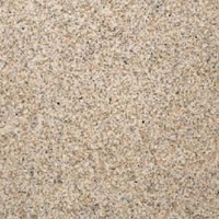 Close-up of a textured soft stone surface in beige and brown hues.